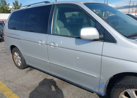 2003 Honda Odyssey Ex-L z USA, uszkodzony, nr VIN 5FNRL18933B117892